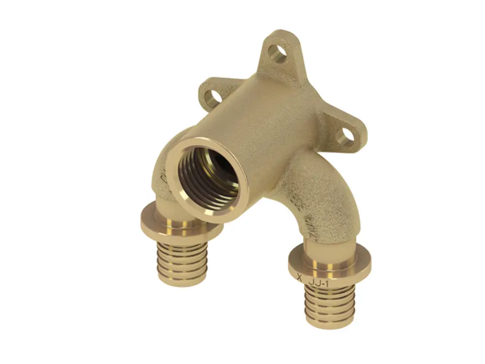 TECE-Produkt mit doppelt gewinkelten Anschlüssen, befestigt an Wand, aus Siliziumbronze. Sichtbare Gewinde und Montagepunkte.